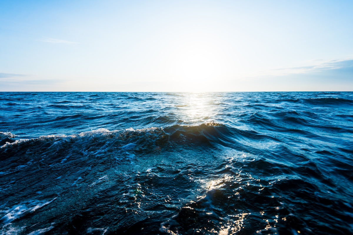 Ocean waves sun on horizon AdobeStock 294902385 OEM WSR