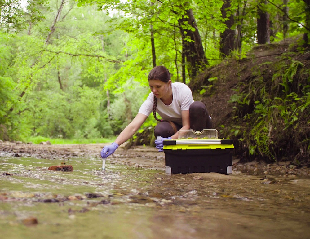 Woman Using Environmental Science Degree copy